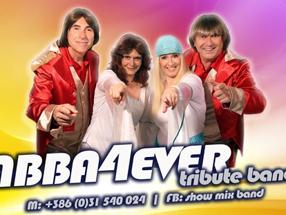 Hochzeitsmusik - Musikrichtungen: Hits von Heute - Erleben Sie mit der ABBA4EVER – tribute band den großartigen ABBA Sound der 70er Jahre.
1982 löste sich die Erfolgsband ABBA auf und ließ Millionen von Fans zurück! Die ABBA4EVER tribute band bringt die unvergessenen 70 Jahre und diese wunderbaren, zeitlosen Hits wieder auf die Bühne mit ihrer ABBA SHOW. 2024 ganz diesem Jubiläum zu wiedmen : Unter dem Motto,,50 Jahre Waterloo.Es war eine Sternstunde in der Gaschichte des Eurovision Song Contests,als das junge Quartett aus Schweden am 6.April 1974 im Dome von Brighton GB mit,,Waterloo einen überlegenen Sieg feierte.
ABBA4EVER tribute band – ABBA Show 
In den vergangenen drei Jahren standen die vier Profimusiker Mojca Sedminek-Vuherer (Agnetha), Simone Kropec (Anni Frid), Levin Oparenovic (Björn) und Aleksander Svetko (Benny) als ABBA4EVER tribute band über 100 Mal im In– und Ausland auf der Bühne mit ihrer sensationellen ABBA Show. 
Diese einzigartige ABBA Show der Gruppe ABBA4EVER tribute band lässt die einmalige Glam- und Glitzerzeit neu aufleben. Sie vermittelt mit ihrer überzeugenden Bühnenshow und den Original-Outfits die Unbekümmertheit und die Lebensfreunde dieser Zeit.
Man sieht der ABBA4EVER tribute an das ihre Auftritte Spaß machen und man erkennt die Musikfreude auf der Bühne. 
Mit musikalischer Perfektion und sprühender Energie werden die wunderbaren ABBA-Songs von der ABBA4EVER tribute präsentiert und das Publikum wird sozusagen mitgerissen in die einzigartige ABBA-Welt.
Lassen Sie sich und Ihr Publikum für 2 Stunden zurückversetzen in die 70er Jahre und singen und tanzen Sie mit zu den unvergesslichen Welterfolgen von ABBA mit der 
 - ShowMix Band
